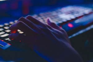 a hand and keyboard
